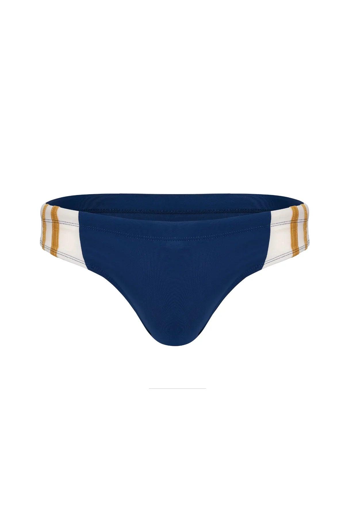 Navy blue men's bikini brief with white and gold striped waistband, stylish swimwear design